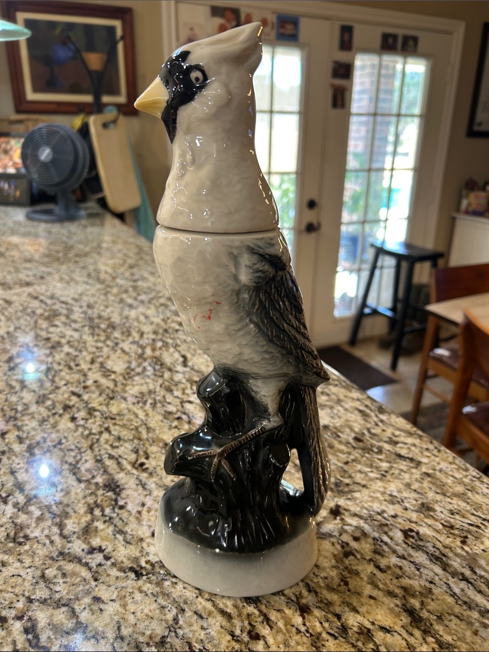 Vintage ceramic cockatoo decanter that was produced by Jim Beam in 1969